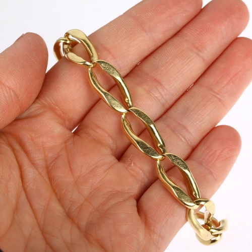 1165 - A heavy 18ct gold elongated curb link chain bracelet, maker S&S, London 1979, 18cm, 40.1g