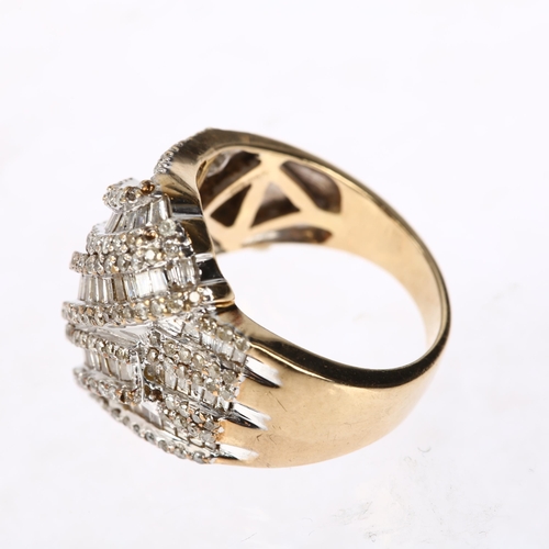 1171 - A large modern 9ct gold diamond cluster cross over ring, set with baguette and modern round brillian... 