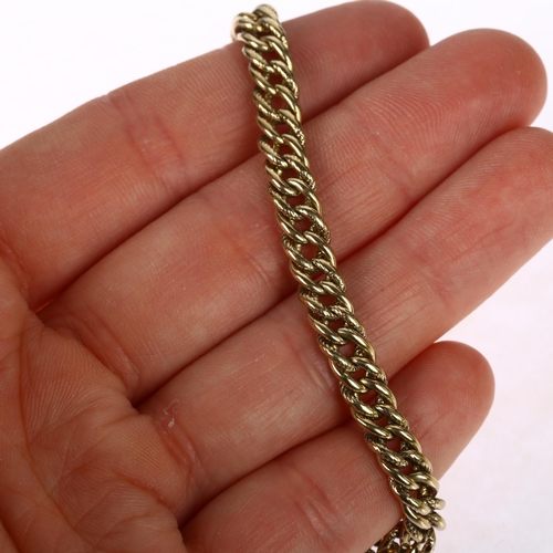 1194 - A 9ct gold curb link chain bracelet, 20cm, 19.3g