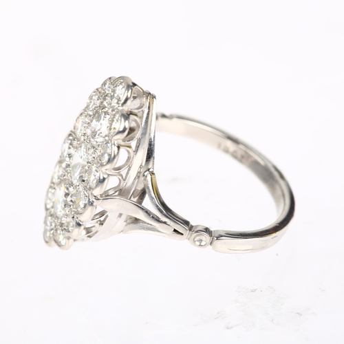 1196 - A large 18ct white gold diamond triple cluster cocktail ring, pave set with modern round brilliant-c... 