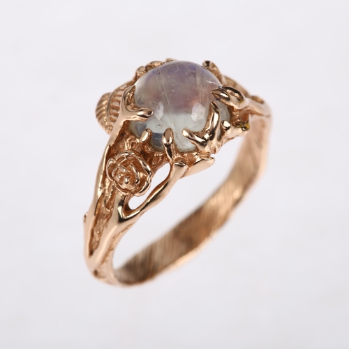 1204 - A modern moonstone naturalistic ring, realistically designed as branches holding a round cabochon mo... 