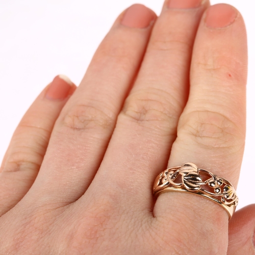 1205 - CLOGAU - a Welsh 9ct rose gold berry openwork band ring, Sheffield 1997, band width 7.8mm, size Q, 4... 