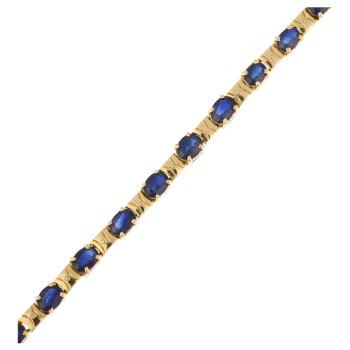 1212A - An 18ct gold sapphire tennis line bracelet, claw set with oval mixed-cut sapphires, 16.5cm, 10.3g