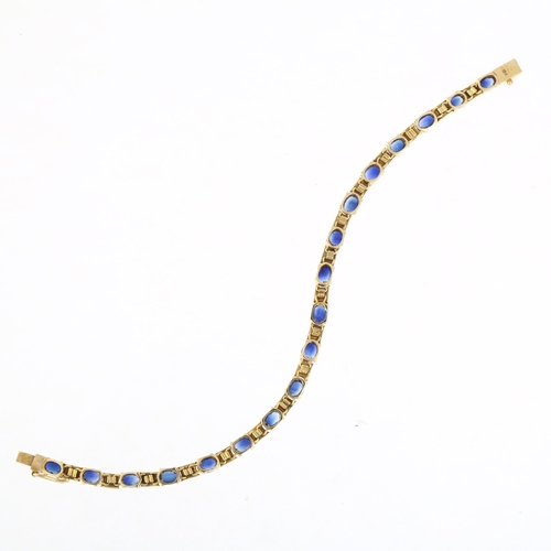 1212A - An 18ct gold sapphire tennis line bracelet, claw set with oval mixed-cut sapphires, 16.5cm, 10.3g