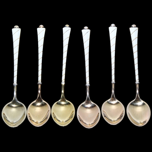 1667 - EGON LAURIDSEN - a set of Danish vermeil sterling silver and white enamel coffee spoons, 9.5cm