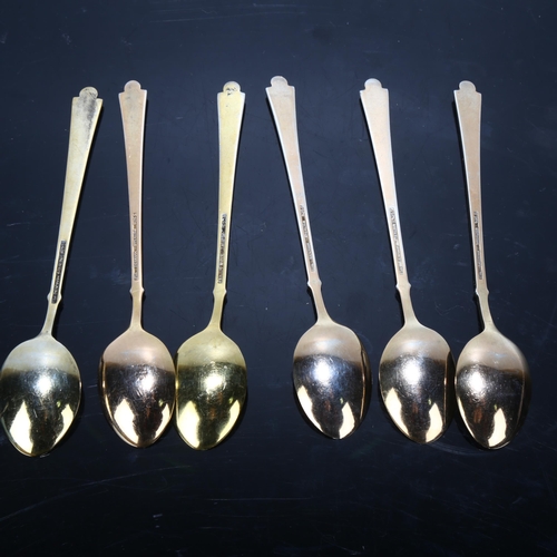 1667 - EGON LAURIDSEN - a set of Danish vermeil sterling silver and white enamel coffee spoons, 9.5cm