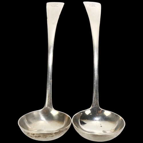 1692 - A pair of Edwardian silver Old English pattern sauce ladles, Josiah Williams & Co, London 1907, with... 