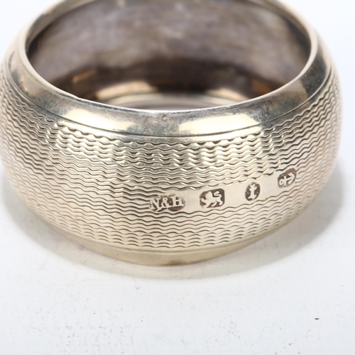 1693 - A cased set of 6 Victorian silver napkin rings, Nathan & Hayes, Birmingham 1893, 4.5cm, 2.4oz, and a... 