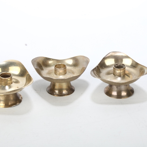 1705 - A set of 4 Egyptian silver taper stick holders, width 6cm, 4.2oz total