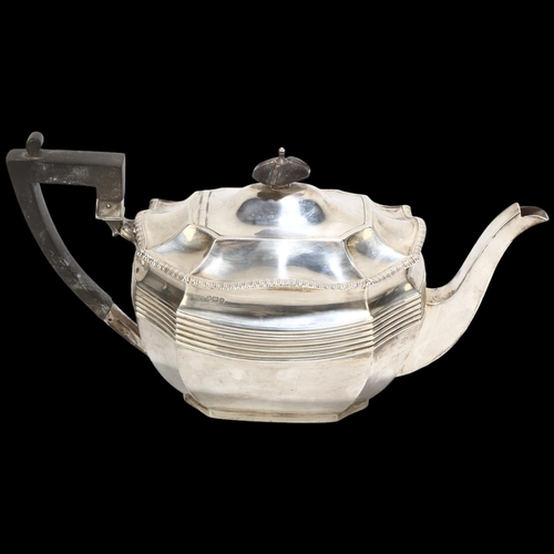 1713 - An Edwardian silver teapot, James Dixon & Sons Ltd, Sheffield 1905, shaped oval form with ebony moun... 