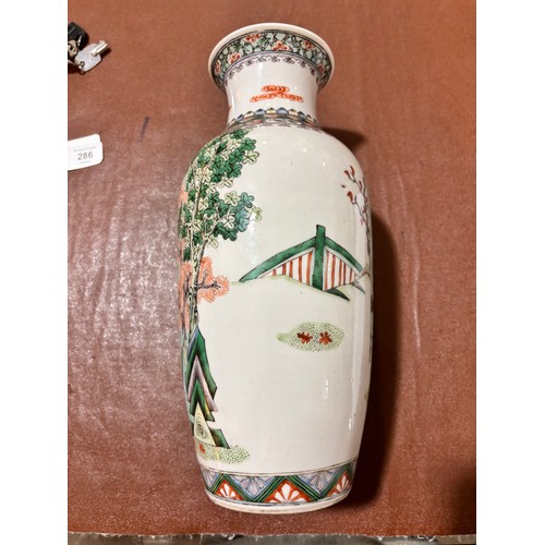 232 - A Chinese porcelain vase with painted enamel decoration, height 31cm