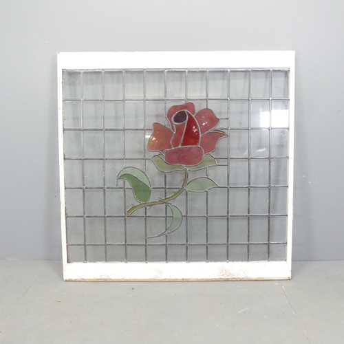 2684 - A leadlight glazed window with rose design. 114x113cm.