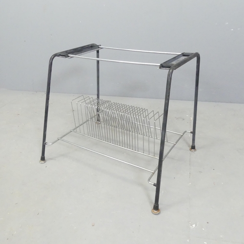 2688 - A mid-century magazine rack in tubular metal frame. 57x44x44cm.