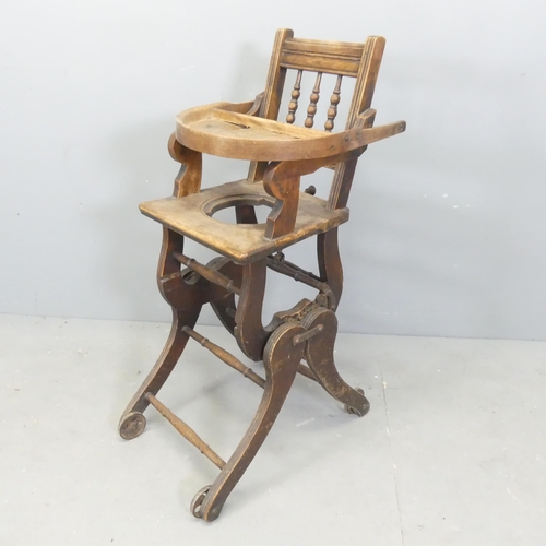 2689 - An early 20th century oak metamorphic high chair. Dimensions as chair 37x94x58cm.