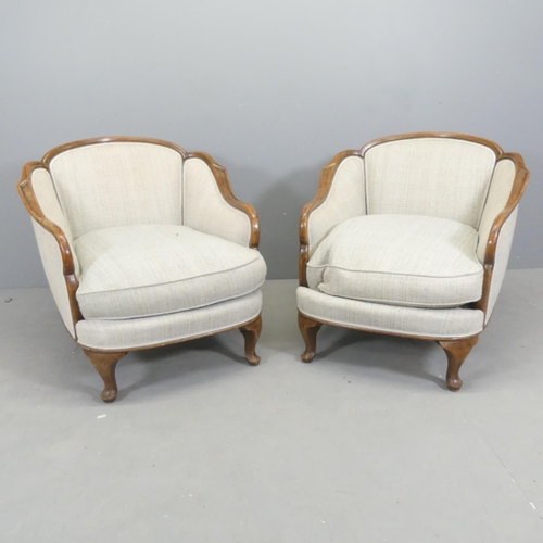 2691 - A pair of continental Art Deco style cloud back oak and upholstered lounge chairs