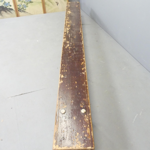 2695 - A vintage stained pine school gymnasium bench. 267x29x25cm