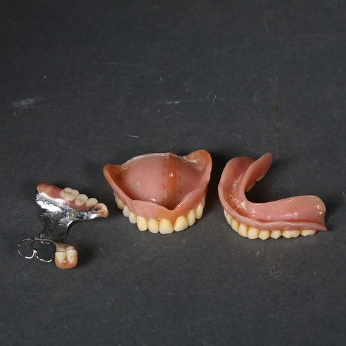 125 - Curiosity / Macabre - a Pair of Vintage dentures, together with another palate clip denture. A pair,... 