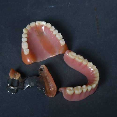 125 - Curiosity / Macabre - a Pair of Vintage dentures, together with another palate clip denture. A pair,... 