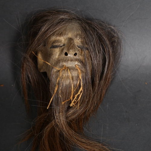 131 - A Shrunken Head (Tsam tsa) sculpture, originally used for trading and human rituals, height 10cm