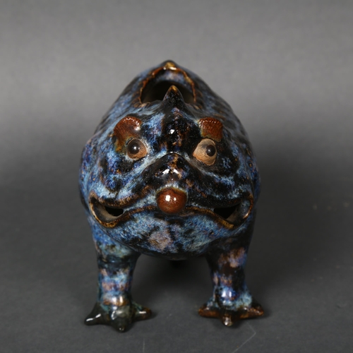 158 - A Grotesque three-legged ceramic toad, in the style of Burmantofts, unmarked, length 18cm.