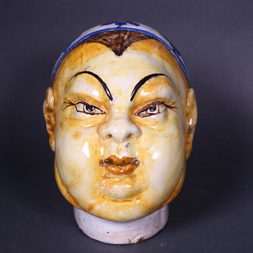 172 - A 19th century maiolica head of an Oriental Gentleman, height 17.5cm.