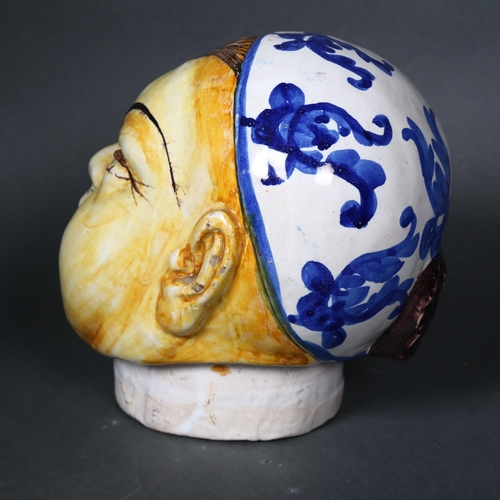 172 - A 19th century maiolica head of an Oriental Gentleman, height 17.5cm.