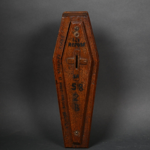 190 - An early 20th century apprentice piece coffin shaped oak money box, possibly French, with a painted ... 