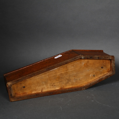 190 - An early 20th century apprentice piece coffin shaped oak money box, possibly French, with a painted ... 