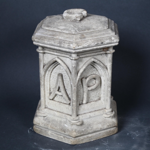 204 - An Antique plaster burial casket, embossed with letters and lid, height 21cm.