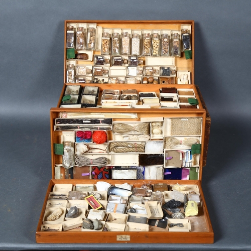 425 - A vintage pine collectors box containing four trays of various interesting items, including various ... 