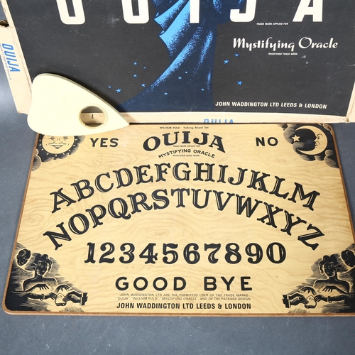 434 - William Fuld - a 1960's Ouija board, complete with original planchette and in original box. Publishe... 