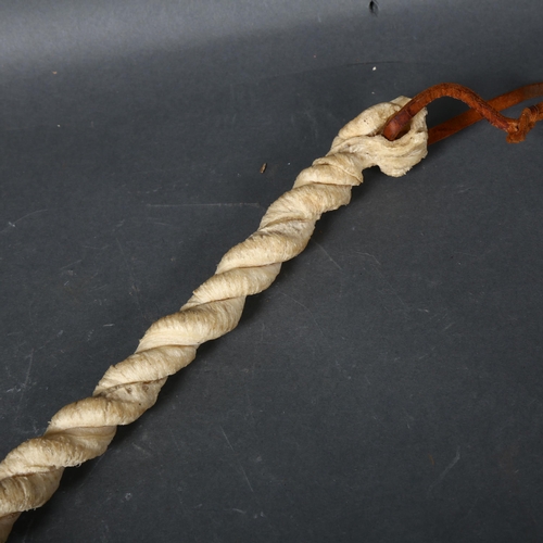 436 - An Antique Bulls Pizzle whip/riding crop, length 77cm.