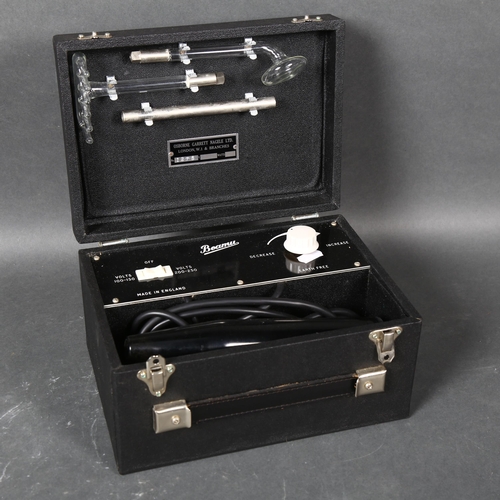 438 - A Beamu, an electric shock machine by Osborne Garrett Nagele Limited, number 1275, cased, width 25.5... 