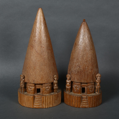 448 - C H Weiss, New Caledonia, two carved hardwood models of traditional houses, incised marks to base, t... 