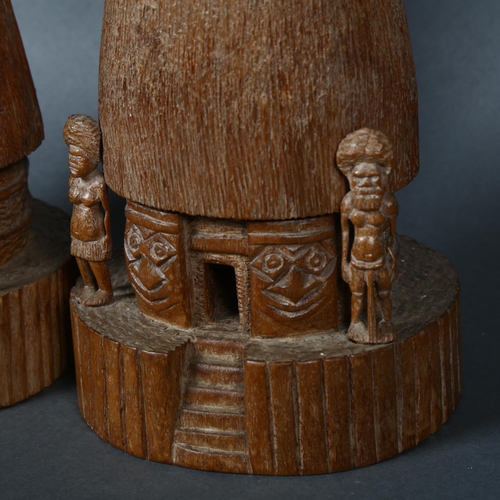 448 - C H Weiss, New Caledonia, two carved hardwood models of traditional houses, incised marks to base, t... 