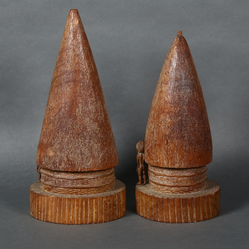 448 - C H Weiss, New Caledonia, two carved hardwood models of traditional houses, incised marks to base, t... 