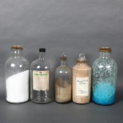 449 - A selection of large antique glass apothecary bottles, some with contents and associated labels, lar... 