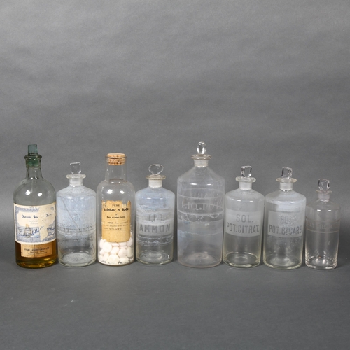 450 - A selection of antique glass apothecary bottles, some with contents and associated labels, largest h... 