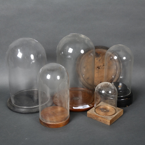 451 - A group of various vintage an other glass domes, some with associated stands, additional spare woode... 