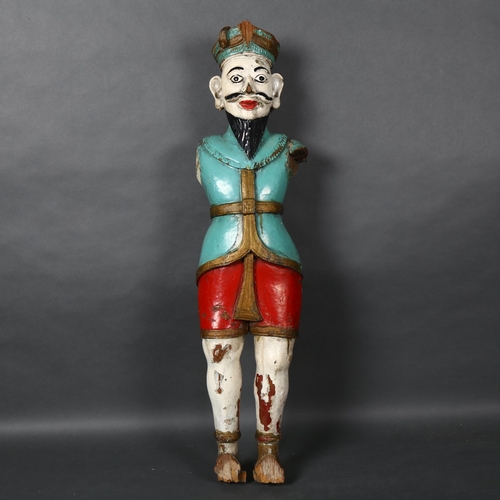 467 - A carved and painted wooden study of an eastern figure (AF) H80cm