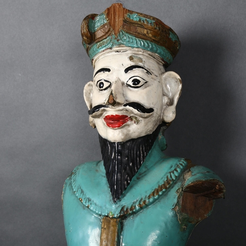 467 - A carved and painted wooden study of an eastern figure (AF) H80cm