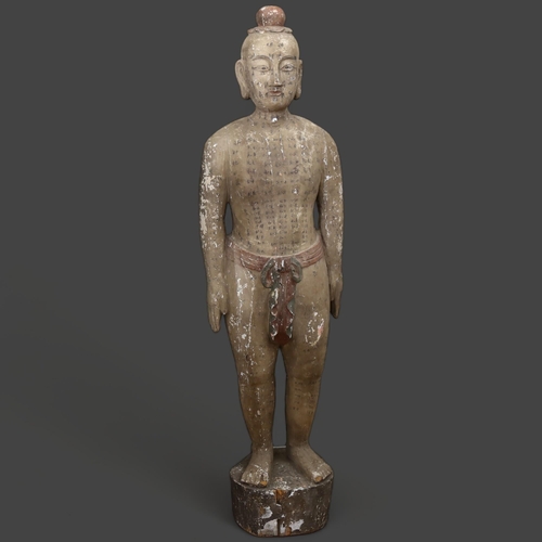 506 - A carved and painted Acupuncturist figure, Chinese, 18th/19th Century, a male figure, gesso covered,... 