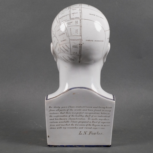 520 - A 19th century Phrenology head by L.N. Fowler, height 29cm.