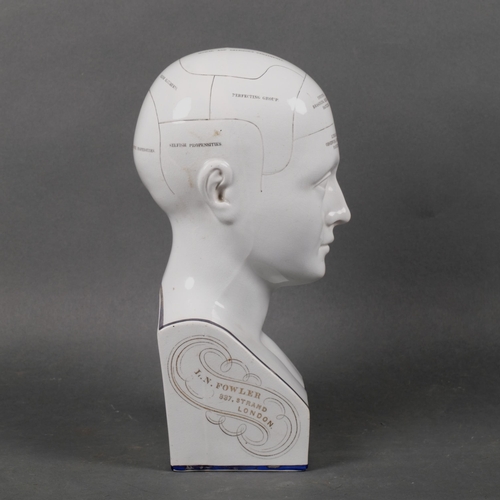 520 - A 19th century Phrenology head by L.N. Fowler, height 29cm.