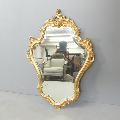 2701 - A modern Rococo style wall mirror. 59x82cm.