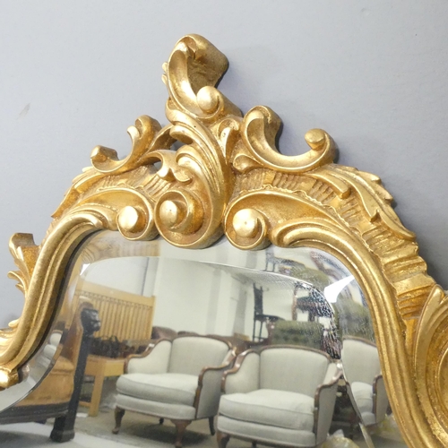 2701 - A modern Rococo style wall mirror. 59x82cm.