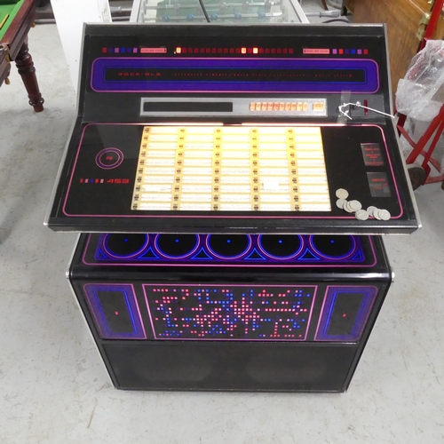 2713 - A Rock-Ola R453 Jukebox with vinyl records, circa 1970s. Working order.