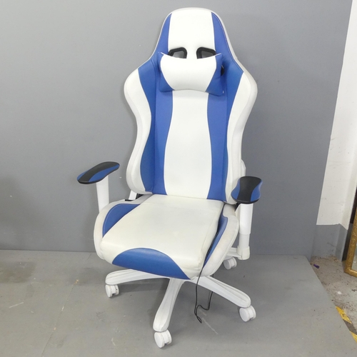 2710 - A contemporary gaming chair, with LED lighting and swivel and rise and fall mechanisms.