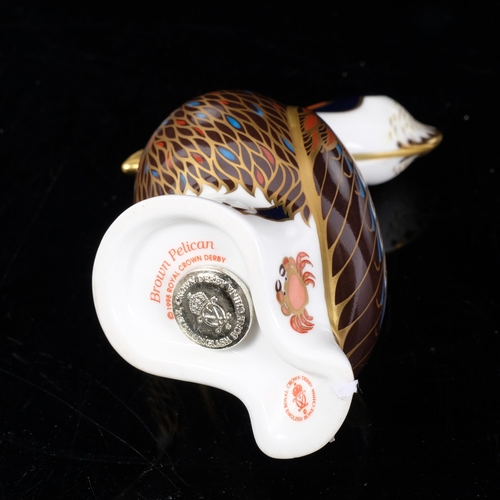 392 - Royal Crown Derby, a brown pelican paperweight with silver stopper, H13cm