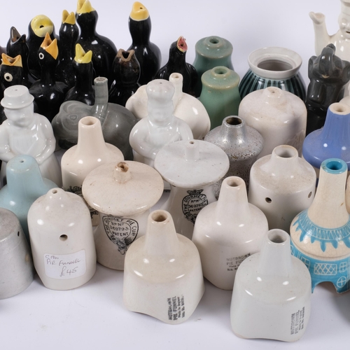 668 - A collection of pie funnels, mustard pots etc